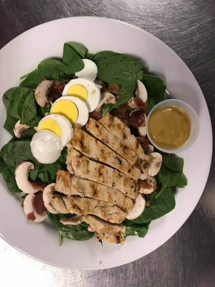 Spinach salad with grilled chicken at Johnny Dee’s Lounge